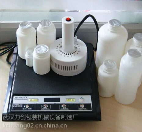 供应10cm内瓶口均适用铝箔封口机，电磁感应铝箔封口机多少钱，机油桶锡箔片封口机