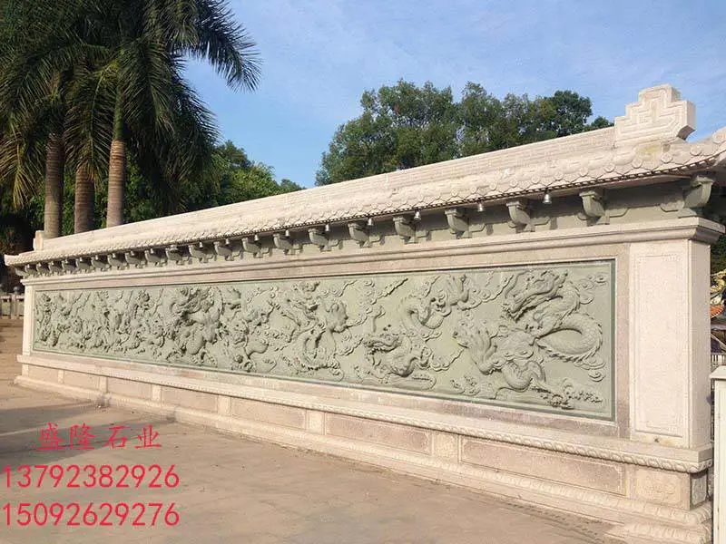 寺庙祠堂石雕九龙壁画多少钱，青石九龙壁照壁厂家批发报价