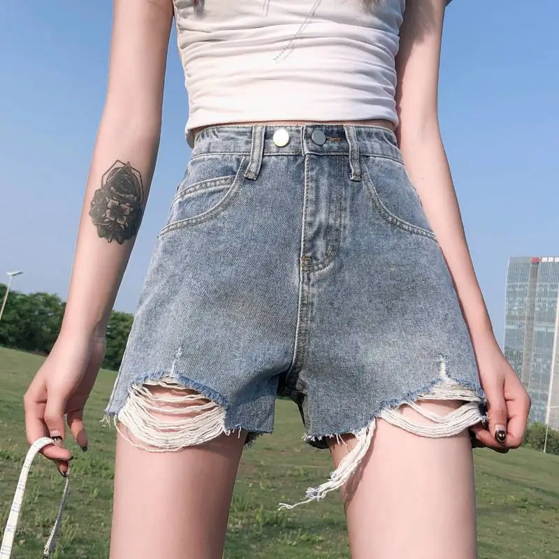 沈阳地摊服装哪里高腰牛仔短裙女夏潮青岛5元服装批发