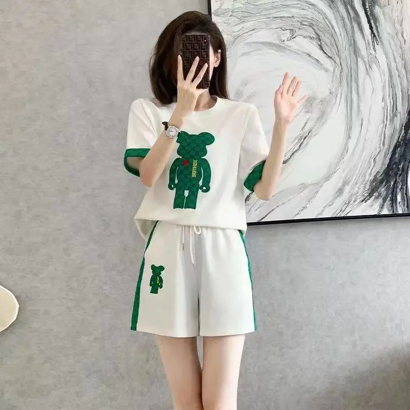 江西鹰潭哪里有女士套装批发大码休闲女士套装批发宽松大版T恤衫批发
