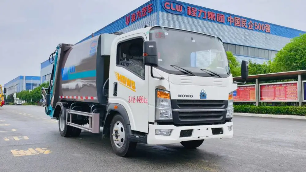 重汽豪沃6.5方新能源压缩垃圾车 蓝牌地库专用垃圾转运车