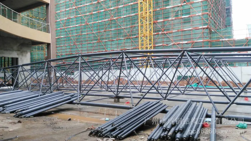 2026年广东大跨体育展馆网架_球形弧型异形螺栓球网架玻璃采光顶