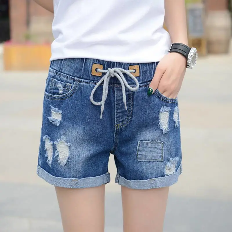 沈阳地摊服装哪里高腰牛仔短裙女夏潮青岛5元服装批发