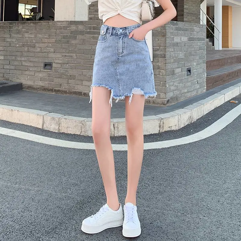 沈阳地摊服装哪里高腰牛仔短裙女夏潮青岛5元服装批发