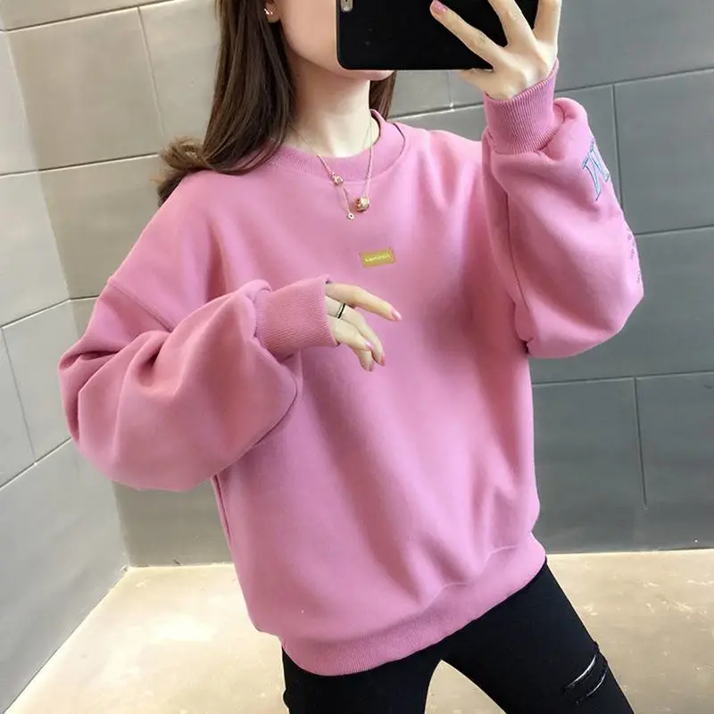 新手批发衣服怎么拿货学院风圆领卫衣女潮ins圆领卫衣地摊批发服装地摊照片