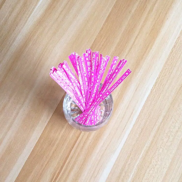 玫红底白字面包扎带 旺鼎 4mmx10cm 1000支/1包 吐司 膨化食品 玩具 花束