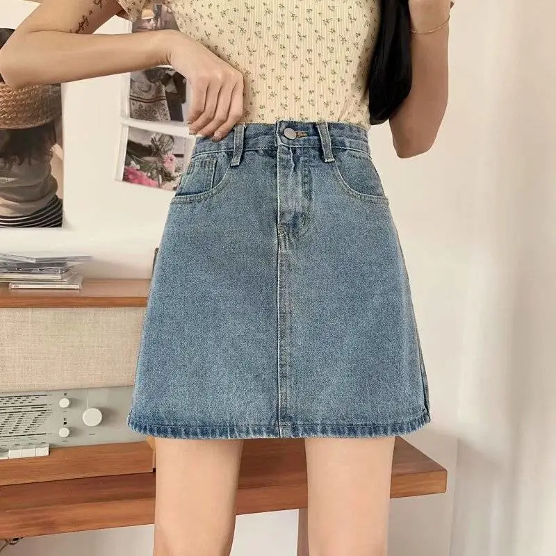 沈阳地摊服装哪里高腰牛仔短裙女夏潮青岛5元服装批发