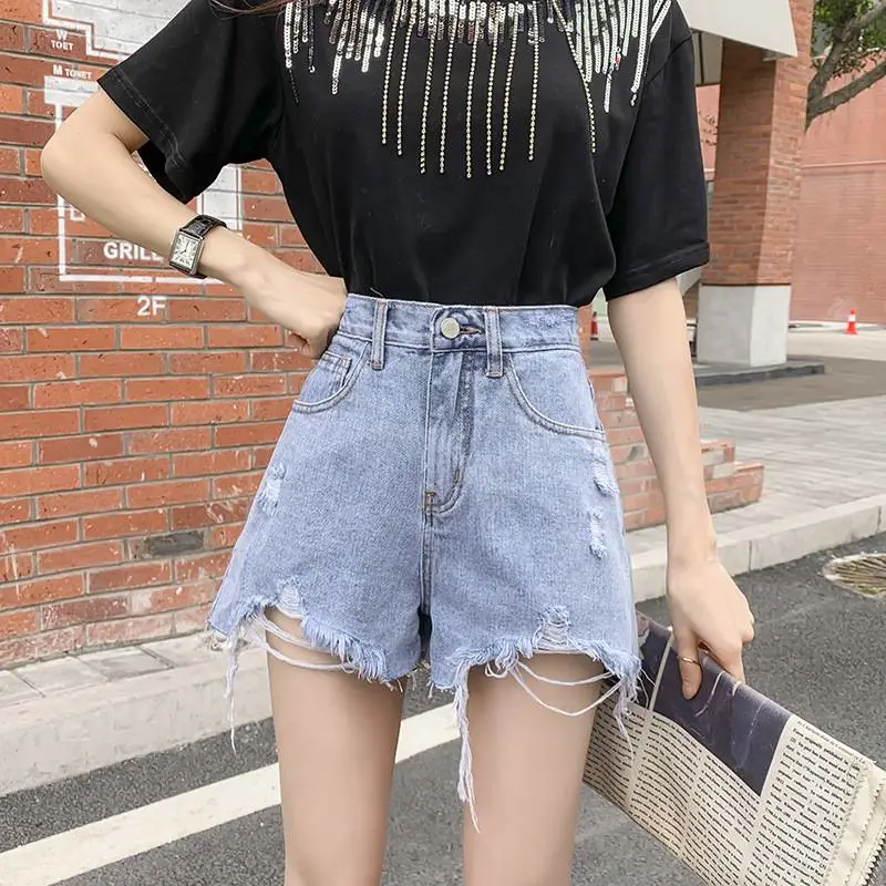 南宁地摊货服装最多的地方在哪里短裙女显瘦宽松可爱潮中老年人服装5元批发