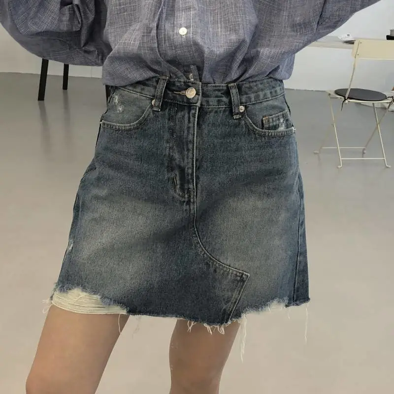 沈阳地摊服装哪里高腰牛仔短裙女夏潮青岛5元服装批发