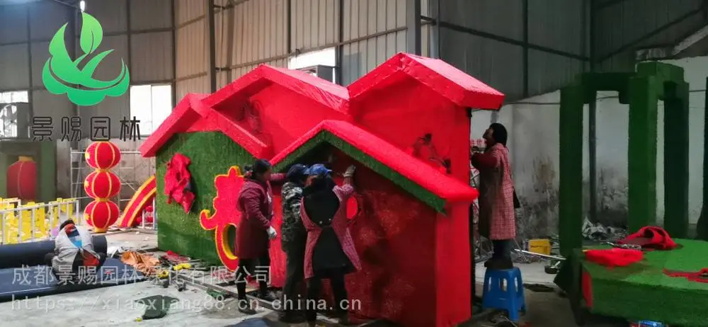 四川泸州雕塑图片 ,扇子造型摆件节庆植物绿雕