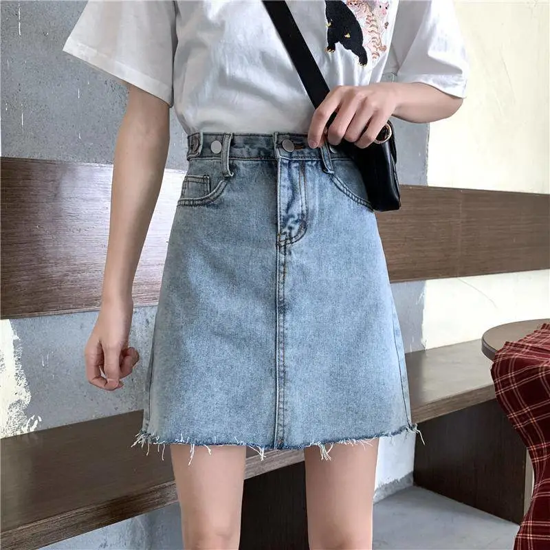 沈阳地摊服装哪里高腰牛仔短裙女夏潮青岛5元服装批发