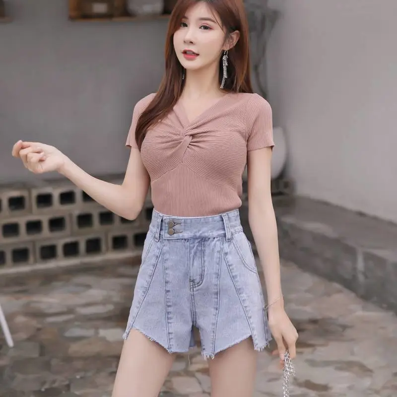 沈阳地摊服装哪里高腰牛仔短裙女夏潮青岛5元服装批发