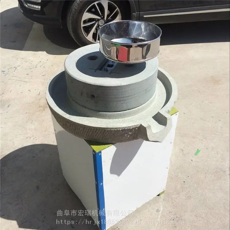 苏州花生酱石磨机白色砂岩石电动石磨磨芝麻酱石磨