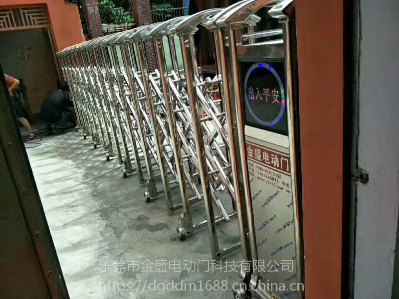 广东东莞金盛电动门厂家价格不锈钢铝合金电动车库门 整套金属商铺卷闸门 商场透明水晶卷帘门安装