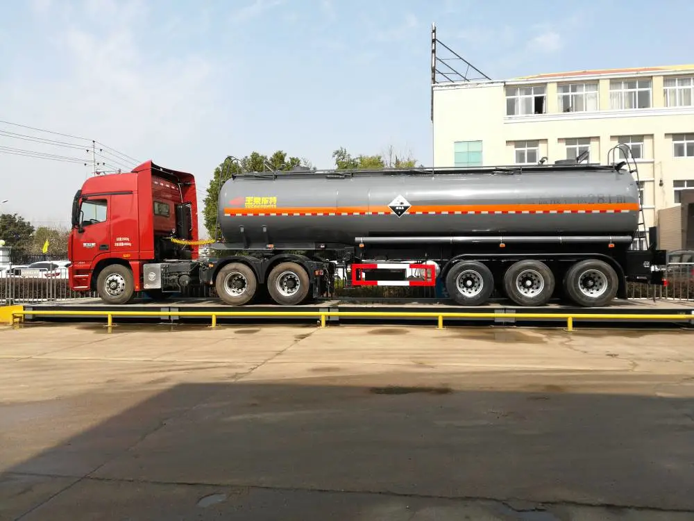 空气悬挂危险品半挂车,氢氧化钠钢衬塑罐车 钢衬塑运输罐车高性价比