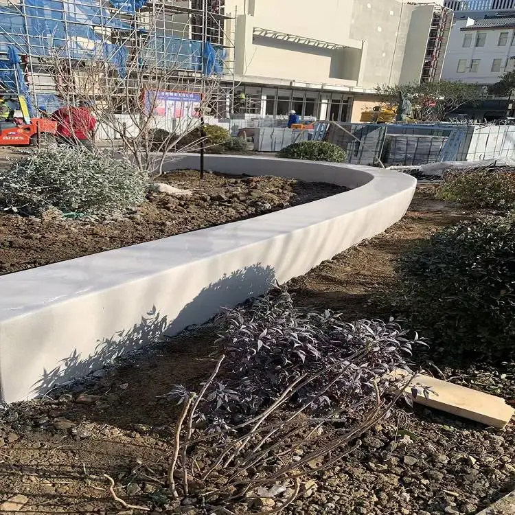 新疆景区坐凳新款式真石丽泰科石制品 喀什学校泰克石花坛建材