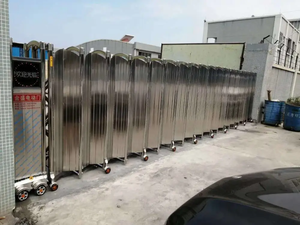 金盛电动门 深原木纹色车库门 双层铝合金车库卷帘门 遥控电动卷闸门
