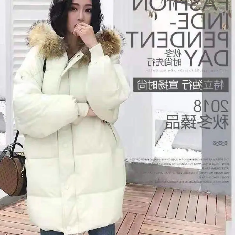 陕西渭南亏本处理棉衣货源几块钱服装毛衣批发拼色羽绒棉衣女学生