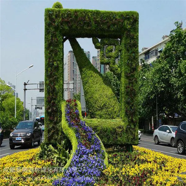 重庆市绿雕图片 ,倾倒的创意花瓶植物景观绿雕定制厂家