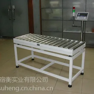 杭州冶金建材厂生产车间不锈钢称重辊道称 75kg称金属矿合物的滚筒称
