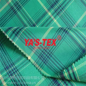 色织提花布 全涤纬弹格子图案 裤装皮肤衣面料 防水耐磨