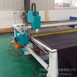 皮革布料定制旋转刀切割机 济南易雕 1626 汽车脚垫座套坐垫激光下料