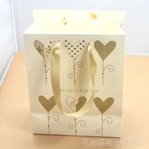 厂家供货白卡纸服装店包装袋 温州礼品袋生产厂家 送礼结婚生日礼品袋纸袋 可印刷LOGO