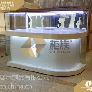 款苹果连体手机柜_玻璃式苹果弧形手机柜台厂家