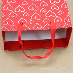 厂家中号黄牛皮服装店包装袋 温州生日礼品袋纸袋 可印刷LOGO