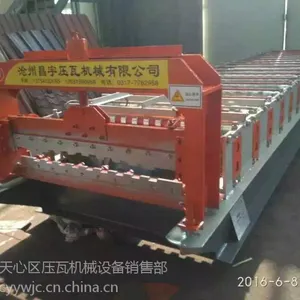 800卷帘门彩钢压瓦机湖南长沙天心区专营买卷帘门赠和缝机致富热线:13657313991孙经理