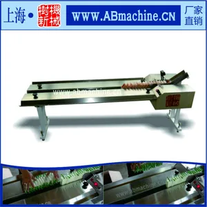 树新机械SMZL-110/150全自动整理机,配合枕式包装机使用,适合方形,圆形,小盒装,片装包装物