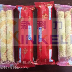 超市蛋卷带托盒称重枕式自动包装机,新科力蛋卷套袋打包封口机