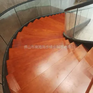 佛山尚步梯业实木踏板钢化玻璃护栏弧型微旋转楼梯厂家定制生产