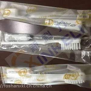 新科力进口牙膏牙刷枕式自动套袋封口包装机械厂