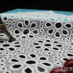 机织镂空牛奶丝绣花布