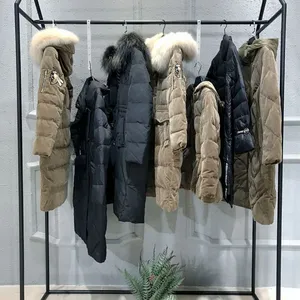 伊袖品牌女装尾货代理折扣 品牌女装尾货库存批发市场酒红色打底裤