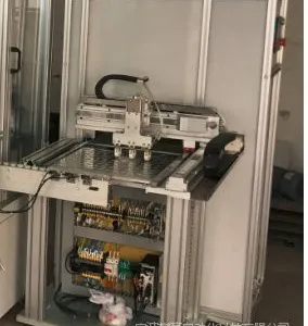 吸塑托盘自动上下料机实现托盘的自动换盘以及物料的自动收放料