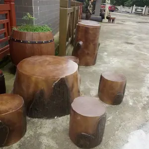 驰升湿地公园混凝土仿树桩桌子,仿木纹凳子,四川水泥仿木坐凳厂家