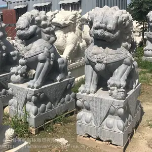 ��ʯʯͷʨ�� ������ʯ��ʨ��һ�Ի�����ʨ�ӵ�λ�ſڰڼ�
