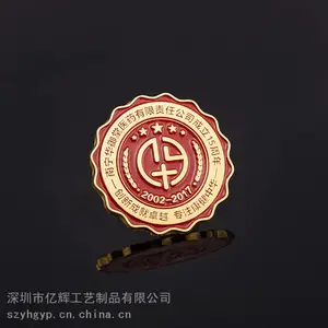 定做徽章的厂家,找设计制作logo胸章工厂,铜材质集团胸章定制