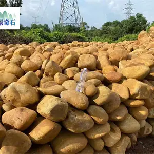 广东黄蜡石刻字加工基地/黄蜡石茶几石凳定制/人工可搬动的黄蜡石