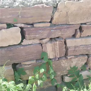 挡墙石材 红色砌墙石块 红色垒墙石自然面 粉红色干砌片石 10-15cm厚度