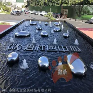 清远城市创意设计镜面玫瑰金不锈钢鹅卵石雕塑弥漫着浪漫的氛围