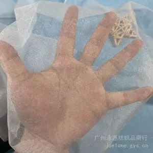 现货闪光米兰网纱 20D锦纶超密闪光菱形网 高端婚纱礼服专用布料