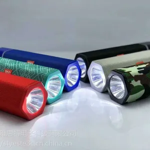 TG603新款手电筒设计户外防水蓝牙音箱低音炮娱乐布艺无线音箱厂家直销