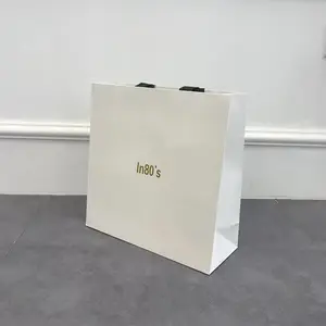 铜版纸手提礼品袋 定制印刷logo 服装店购物袋 加厚牛皮纸 可批发
