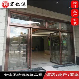 售楼部酒店无指纹玫瑰金拉丝不锈钢地弹门 不锈钢夹花大门