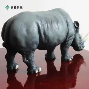 户外仿真犀牛模型雕塑园林景观草坪玻璃钢假动物大型落地装饰摆件