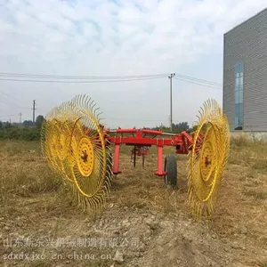80弹齿旋转式草把子收集机 指盘式大型搂草机