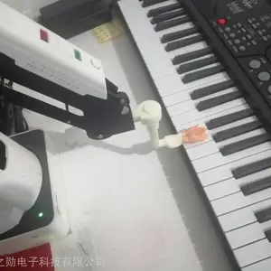 弹钢琴机器人,机械臂机器人弹钢琴,艺术型机器人